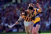 15 August 1999; Philip Larkin of Kilkenny in action against Niall Gilligan of Clare during the Guinness All-Ireland Senior Hurling Championship Semi-Final match between Kilkenny and Clare at Croke Park in Dublin. Photo by Ray McManus/Sportsfile
