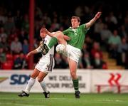 31 August 1999; Republic of Ireland's Richard Dunne in action against Nikola Lazetic of Yugoslavia during the UEFA European U21 Championships Qualifying match between Republic of Ireland and Yugoslavia at Tolka Park in Dublin. Photo by Brendan Moran/Sportsfile