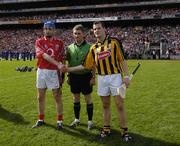 3 September 2006; Cork captain Pat Mulcahy shakes hands with Kilkenny captain Jackie Tyrrell, right, in the presence of referee Barry Kelly before the game. Guinness All-Ireland Senior Hurling Championship Final, Cork v Kilkenny, Croke Park, Dublin. Picture credit: Ray McManus / SPORTSFILE
