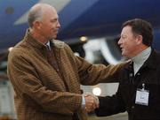 18 September 2006; Tom Lehman, left, 2006 Ryder Cup Team USA captain, is greeted by Ian Woosnam, 2006 Ryder Cup EuropeanTeam captain, on their arrival at Dublin Airport ahead of the 2006 Ryder Cup which will be taking place in the K Club, Straffan, Co Kildare between September 22 - 24, 2006. Picture credit: David Maher / SPORTSFILE