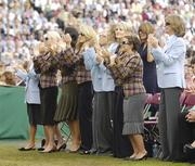 21 September 2006; Wives and girlfriends of the players of Team Europe 2006, applaud the performers during the formal opening ceremony of the 36th Ryder Cup at the K Club, Straffan, Co Kildare, Ireland. Picture credit: Brendan Moran / SPORTSFILE