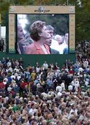21 September 2006; President Mary McAleese on a video screen stands for the National Anthem during the opening ceremony of the 36th Ryder Cup at the K Club, Straffan, Co. Kildare, Ireland. Picture credit: Damien Eagers / SPORTSFILE