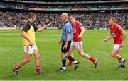 3 August 2014; Cork selector Ciarán O'Sullivan, left, with players Colm O'Neill and Brian Hurley, speaks to referee Cormac Reilly as he leaves the field. GAA Football All-Ireland Senior Championship, Quarter-Final, Mayo v Cork, Croke Park, Dublin. Picture credit: Ray McManus / SPORTSFILE