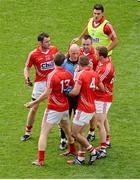 3 August 2014; Cork players, left to right, Donncha O'Connor, Colm O'Neill, Noel Galvin, Paul Kerrigan, Tomás Clancy, and John Hayes, speak to referee Cormac Reilly about the amount of time played at the end of the game. GAA Football All-Ireland Senior Championship, Quarter-Final, Mayo v Cork, Croke Park, Dublin. Picture credit: Dáire Brennan / SPORTSFILE