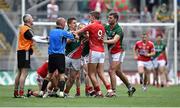 3 August 2014; Aidan Walsh, right, Cork, and Lee Keegan, Mayo, get involved in an altercation in front of referee Cormac Reilly. GAA Football All-Ireland Senior Championship, Quarter-Final, Mayo v Cork, Croke Park, Dublin. Picture credit: Brendan Moran / SPORTSFILE