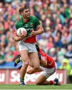 3 August 2014; Aidan O'Shea, Mayo, is tackled by Tomás Clancy, Cork, for which Clancy received a black card. GAA Football All-Ireland Senior Championship, Quarter-Final, Mayo v Cork, Croke Park, Dublin. Picture credit: Brendan Moran / SPORTSFILE