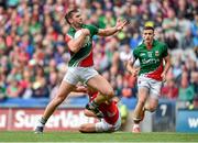 3 August 2014; Aidan O'Shea, Mayo, is tackled by Tomás Clancy, Cork, for which Clancy received a black card. GAA Football All-Ireland Senior Championship, Quarter-Final, Mayo v Cork, Croke Park, Dublin. Picture credit: Brendan Moran / SPORTSFILE