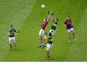 3 August 2014; Fiontán Ó Curraoin, Galway, in action against Kerry players, left to right, Killian Young, David Moran, and Anthony Maher. GAA Football All-Ireland Senior Championship, Quarter-Final, Kerry v Galway, Croke Park, Dublin. Picture credit: Dáire Brennan / SPORTSFILE