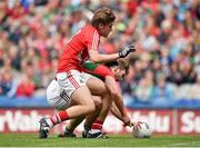 3 August 2014; Aidan O'Shea, Mayo, attempts to clear the ball under pressure from Ian Maguire, Cork, after a shot by Maguire was saved by Mayo goalkeeper Robert Hennelly, during the second half. GAA Football All-Ireland Senior Championship, Quarter-Final, Mayo v Cork, Croke Park, Dublin. Picture credit: Brendan Moran / SPORTSFILE
