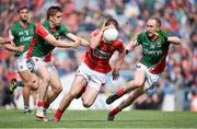 3 August 2014; Colm O'Neill, Cork, in action against Lee Keegan, left, and Tom Cunniffe, Mayo. GAA Football All-Ireland Senior Championship, Quarter-Final, Mayo v Cork, Croke Park, Dublin. Picture credit: Brendan Moran / SPORTSFILE