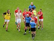 3 August 2014; Cork players and officials speak to referee Cormac Reilly after the game. GAA Football All-Ireland Senior Championship, Quarter-Final, Mayo v Cork, Croke Park, Dublin. Picture credit: Dáire Brennan / SPORTSFILE