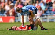 4 August 2014; A dejected Kevin Flahive, Cork, is consoled by Chris Sallier, Dublin after the game. Electric Ireland GAA Football All-Ireland Minor Championship Quarter-Final, Dublin v Cork, Semple Stadium, Thurles, Co. Tipperary. Picture credit: Barry Cregg / SPORTSFILE