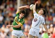 4 August 2014; Tomás Ó Sé, Kerry, in action against Seán Healy, Kildare. Electric Ireland GAA Football All-Ireland Minor Championship Quarter-Final, Kerry v Kildare, Semple Stadium, Thurles, Co. Tipperary. Picture credit: Barry Cregg / SPORTSFILE