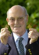 14 September 2006; Former Mayo footballer Eamonn Mongey with his All-Ireland winners medals from 1950 and 1951 at his home in Monkstown, Co. Dublin. Picture credit: Damien Eagers / SPORTSFILE