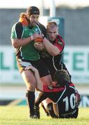22 September 2006; Gavin Williams, Connacht, is tackled by Phil Godman and Simon Webster, Edinburgh Gunners. Magners Celtic League 2006 - 2007, Connacht v Edinburgh Gunners, Sportsground, Galway. Picture credit: Ray Ryan / SPORTSFILE