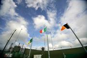 24 September 2006; Crossmaglen, Clann Na Gael and the tri colour fly in front of Crossmaglen army base, which is soon to be dismantled. Nugent Catering Supplies Armagh Senior Football Championship Final, Crossmaglen v Clann Na Gael, Oliver Plunkett Park, Crossmaglen, Co Armagh. Picture credit: Russell Pritchard / SPORTSFILE