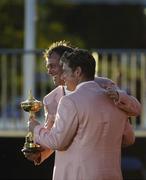 24 September 2006; Darren Clarke and Lee Westwood, Team Europe 2006, with the Ryder Cup after victory over the USA. 36th Ryder Cup Matches, K Club, Straffan, Co. Kildare, Ireland. Picture credit: Brendan Moran / SPORTSFILE