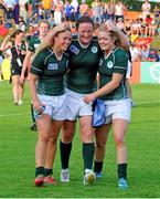 5 August 2014; Ireland players, from left, Ashleigh Baxter, Ailis Egan and Vicky McGinn celebrate victory over New Zealand. 2014 Women's Rugby World Cup Final, Pool B, Ireland v New Zealand, Marcoussis, Paris, France. Picture credit: Aurélien Meunier / SPORTSFILE