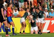 5 August 2014; Ireland players, from left, Ashleigh Baxter, Niamh Briggs Nora Stapleton and Tania Rosser  celebrate victory over New Zealand. 2014 Women's Rugby World Cup Final, Pool B, Ireland v New Zealand, Marcoussis, Paris, France. Picture credit: Aurélien Meunier / SPORTSFILE