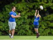 6 August 2014; Jasper Kelly, from Tinahely, Co. Wicklow, reaches for a ball with Leinster player Dominic Ryan during The Herald Leinster Rugby Summer Camps in Gorey RFC, Gorey, Co. Wexford. Picture credit: Matt Browne / SPORTSFILE