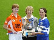 25 September 2006; Armagh captain Bernie McGrath, left, and Laois captain Trish Cuddy, right, with Liz Howard, President of the Camogie Association, and the Nancy Murray Cup at a photocall ahead of the All-Ireland Senior B Camogie Final to be played between Cork and Galway and the All-Ireland Junior Camogie Shield Final to be played between Laois and Armagh on Saturday next. Croke Park, Dublin. Picture credit: Pat Murphy / SPORTSFILE