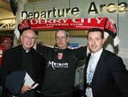26 September 2006; Most Reverend Edward Daly, retired Bishop of Derry, Jim Nicholas a life long Derry City supporter  and Seamus Devine, Eglinton Airport manager, prior to their departure to Paris for the UEFA Cup First Round, Second Leg game against Paris St Germain. Eglington Airport, Derry. Picture credit: Oliver McVeigh / SPORTSFILE