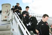 26 September 2006; Derry City players Gary Beckett, Gareth McGlynn, and Barry Molloy arrive at Charles De Gaulle Airport ahead of their UEFA Cup First Round, Second Leg game against Paris St Germain. Charles De Gaulle Airport, Paris, France. Picture credit: Oliver McVeigh / SPORTSFILE