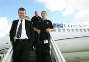 26 September 2006; Derry City manager Stephen Kenny, team physio Com O'Neill, and Declan Devine arrive at Charles De Gaulle Airport, ahead of their UEFA Cup First Round, Second Leg game against Paris St Germain. Charles De Gaulle Airport, Paris, France. Picture credit: Oliver McVeigh / SPORTSFILE