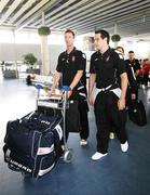 26 September 2006; Derry City players Clive Delaney, left, and David Forde on their arrival at Charles De Gaulle Airport ahead of their UEFA Cup First Round, Second Leg, game against Paris St Germain. Charles De Gaulle Airport, Paris, France. Picture credit: Oliver McVeigh / SPORTSFILE
