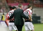 28 September 2006; Derry City manager Stephen Kenny puts on two forward subs Mark Farren and Kevin Mc Hugh. UEFA Cup, First round, Second leg, Paris St Germain v Derry City, Parc des Princes, Paris, France. Picture credit: Oliver McVeigh / SPORTSFILE
