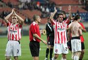 28 September 2006; Derry City players Sean Hargan and Darren Kelly applaud their supporters after the game. UEFA Cup, First round, Second leg, Paris St Germain v Derry City, Parc des Princes, Paris, France. Picture credit: Oliver McVeigh / SPORTSFILE