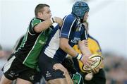 29 September 2006; Jamie Heaslip, Leinster, is tackled by, Keith Matthews, left, and Darren Yapp, Connacht. Magners Celtic League 2006 - 2007, Connacht v Leinster, Sportsground, Galway. Picture credit: Brendan Moran / SPORTSFILE