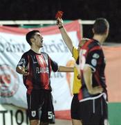 29 September 2006; Dan O'Connor, Longford Town, reacts as referee Pat Whelan show's him the red card. Carlsberg FAI Cup, Quarter-Final, St. Patrick's Athletic v Longford Town, Richmond Park, Dublin. Picture credit: David Maher / SPORTSFILE