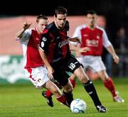 29 September 2006; Robbie Martin, Longford Town, in action against Stephen Brennan, St. Patrick's Athletic. Carlsberg FAI Cup, Quarter-Final, St. Patrick's Athletic v Longford Town, Richmond Park, Dublin. Picture credit: David Maher / SPORTSFILE