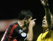 29 September 2006; Davy Byrne, Longford Town, remonstrates with referee Pat Whelan after been shown the red card during the second half. Carlsberg FAI Cup, Quarter-Final, St. Patrick's Athletic v Longford Town, Richmond Park, Dublin. Picture credit: David Maher / SPORTSFILE