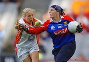 1 October 2006; Elaine Harte, Cork, in action against Maria O'Donnell, Armagh. TG4 Ladies All-Ireland Senior Football Championship Final, Cork v Armagh, Croke Park, Dublin. Picture credit: David Maher / SPORTSFILE