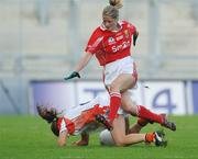 1 October 2006; Juliet Murphy, Cork, in action against Alma O'Donnell, Armagh, during the closing seconds of the game. TG4 Ladies All-Ireland Senior Football Championship Final, Cork v Armagh, Croke Park, Dublin. Picture credit: David Maher / SPORTSFILE