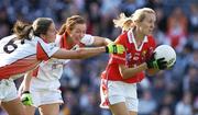 1 October 2006; Nollaig Cleary, Cork, in action against Bronagh O'Donnell, left, and Fiona Quinn, Armagh. TG4 Ladies All-Ireland Senior Football Championship Final, Cork v Armagh, Croke Park, Dublin. Picture credit: Brendan Moran / SPORTSFILE
