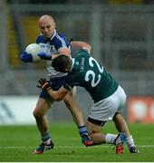 2 August 2014; Stephen Gollogly, Monaghan, in action against Eoin Doyle, Kildare. GAA Football All-Ireland Senior Championship, Round 4A, Kildare v Monaghan, Croke Park, Dublin. Picture credit: Piaras Ó Mídheach / SPORTSFILE