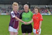 4 August 2014; Team captains Louise Ward, left, Galway and Marie Ambrose, Cork, shake hands in the company of referee Terence McShea before the game. All-Ireland Ladies Football Minor A Championship Final, Cork v Galway, St Brendan's Park, Birr, Co. Offaly. Picture credit: Brendan Moran / SPORTSFILE