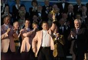 24 September 2006; Team Europe 2006 captain Ian Woosnam shows off the Ryder Cup after it was presented to him by Bertie Ahern, TD, during the Closing Ceremony. 36th Ryder Cup Matches, K Club, Straffan, Co. Kildare, Ireland. Picture credit: Matt Browne / SPORTSFILE