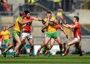 9 August 2014; Michael Murphy, Donegal, in action against Aaron Findon, left, and Tony Kernan, Armagh. GAA Football All-Ireland Senior Championship, Quarter-Final, Donegal v Armagh, Croke Park, Dublin. Photo by Sportsfile