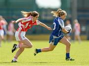 9 August 2014; Ciara McAnespie, Monaghan, in action against Aisling O'Kane, Tyrone. TG4 All-Ireland Ladies Football Senior Championship, Round 2 Qualifier, Monaghan v Tyrone, Pearse Park, Longford. Picture credit: Oliver McVeigh / SPORTSFILE