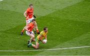 9 August 2014; Michael Murphy, Donegal, in action against Brendan Donaghy, left, and Charlie Vernon, Armagh. GAA Football All-Ireland Senior Championship, Quarter-Final, Donegal v Armagh, Croke Park, Dublin. Picture credit: Dáire Brennan / SPORTSFILE