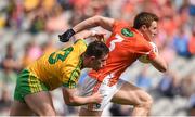 9 August 2014; Charlie Vernon, Armagh, in action against Patrick McBrearty, Donegal. GAA Football All-Ireland Senior Championship, Quarter-Final, Donegal v Armagh, Croke Park, Dublin. Picture credit: Stephen McCarthy / SPORTSFILE