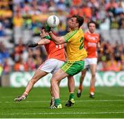 9 August 2014; Kevin Dyas, Armagh, in action against Eamonn McGee, Donegal. GAA Football All-Ireland Senior Championship, Quarter-Final, Donegal v Armagh, Croke Park, Dublin. Picture credit: Ray McManus / SPORTSFILE