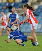 9 August 2014; Terese Scott, Monaghan, in action against Christiane Hunter, Tyrone. TG4 All-Ireland Ladies Football Senior Championship, Round 2 Qualifier, Monaghan v Tyrone, Pearse Park, Longford. Picture credit: Oliver McVeigh / SPORTSFILE