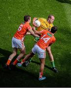 9 August 2014; Neil Gallagher, Donegal, in action against Brendan Donaghy, left, and Stefan Campbell, Armagh. GAA Football All-Ireland Senior Championship, Quarter-Final, Donegal v Armagh, Croke Park, Dublin. Picture credit: Dáire Brennan / SPORTSFILE