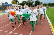 9 August 2014; Ireland Under 18 and Under 16 athletics team runs a victory lap after winning the Celtic Games 2014. 2014 Celtic Games, Morton Stadium, Santry, Co. Dublin. Picture credit: Cody Glenn / SPORTSFILE
