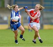 9 August 2014; Ciara McAnespie, Monaghan, in action against Neamh Woods, Tyrone. TG4 All-Ireland Ladies Football Senior Championship, Round 2 Qualifier, Monaghan v Tyrone, Pearse Park, Longford. Picture credit: Oliver McVeigh / SPORTSFILE